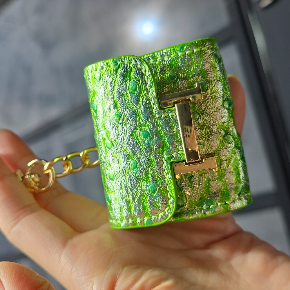 Mini constance Bag Charm airpod case green metallic